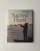 Sacred Hunt: A Portrait of the Relationship Between Seals and Inuit by David F. Pelly hardcover book